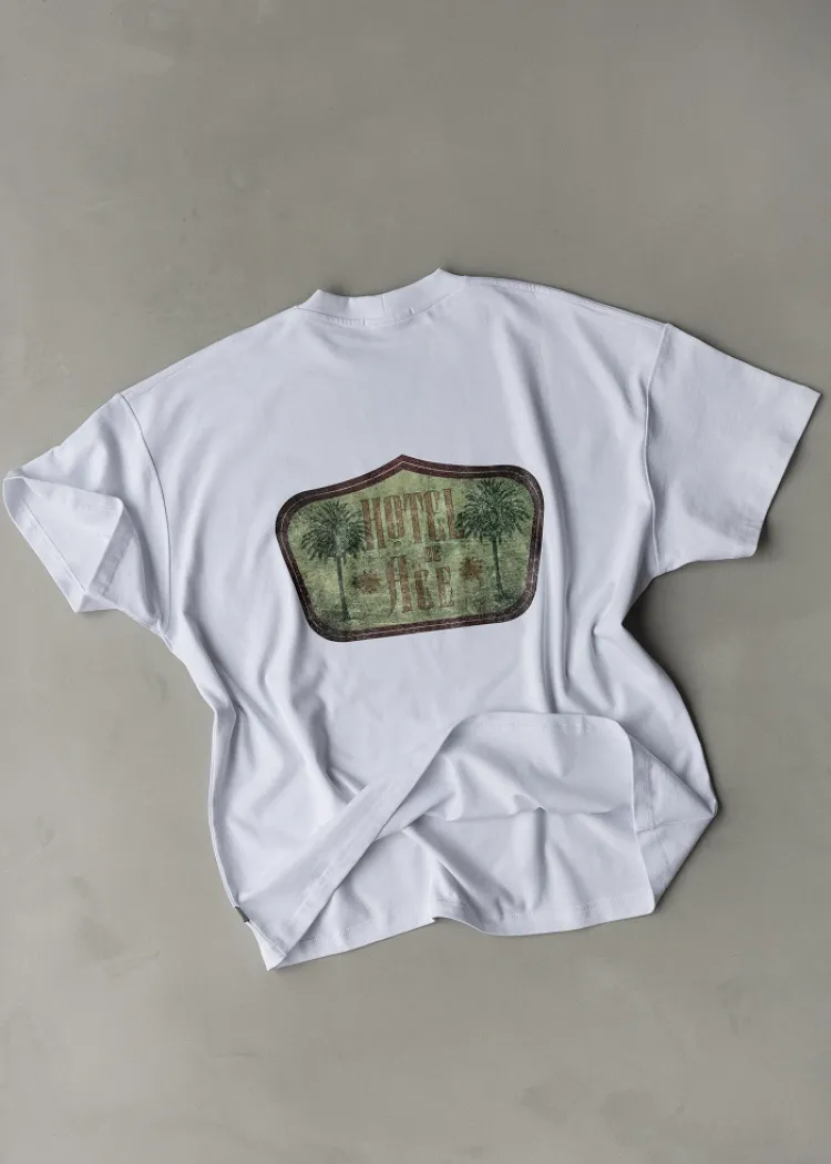 White t-shirt green logo Hotel