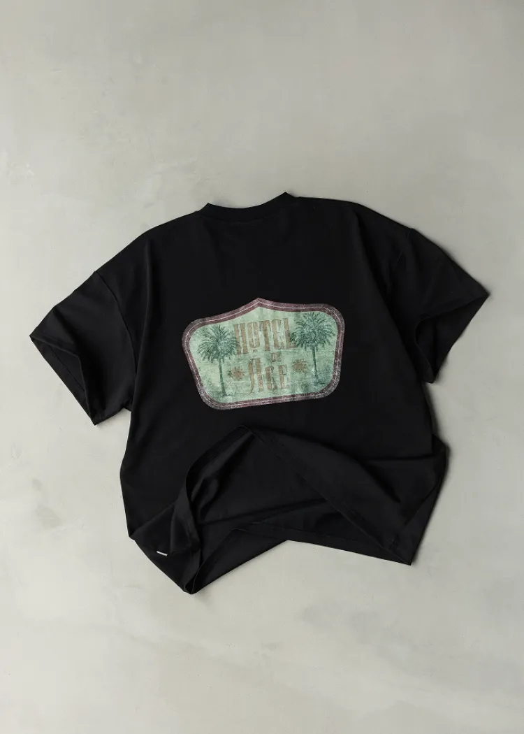Black t-shirt green logo Hotel