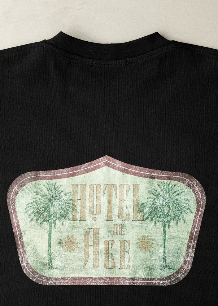 Black t-shirt green logo Hotel