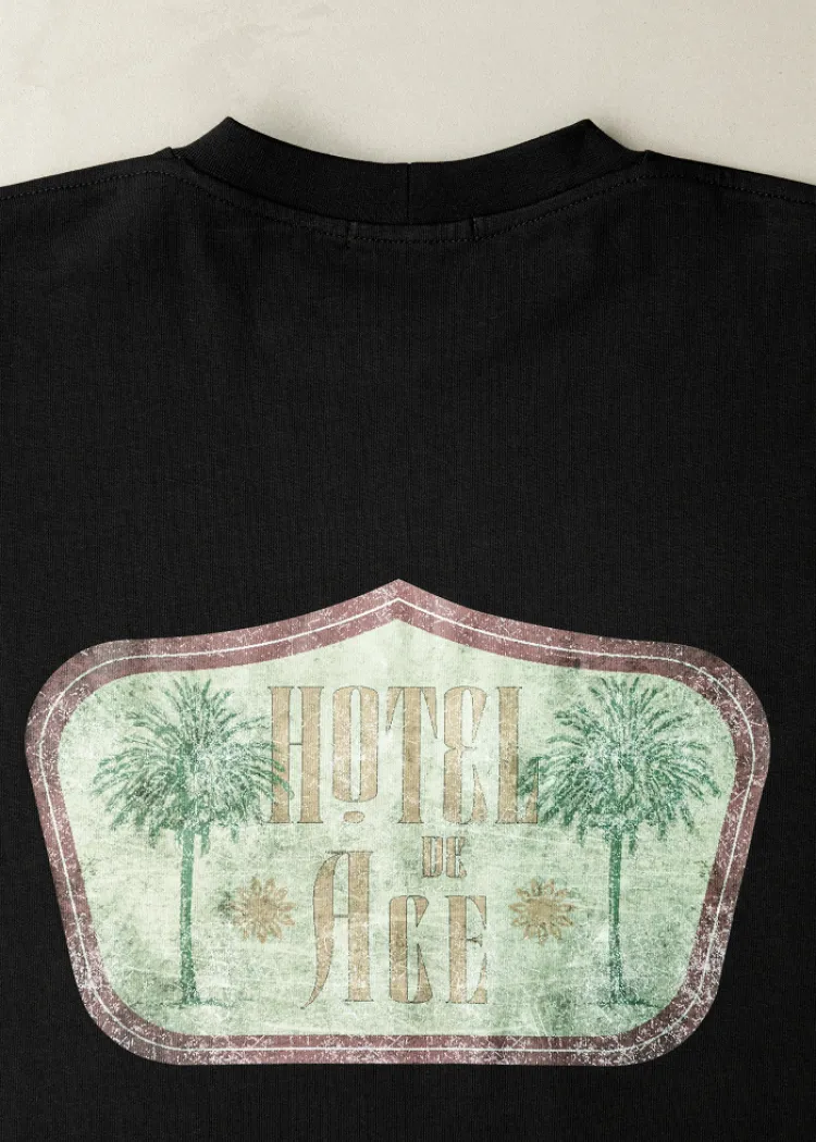 Black t-shirt green logo Hotel